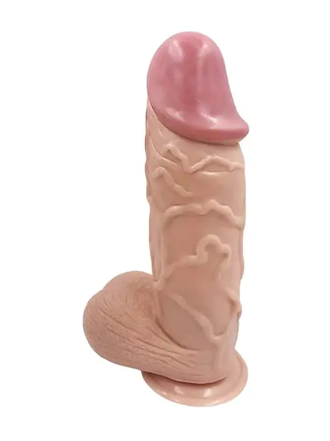Dildo gigante con testículos y chupa 25 cm